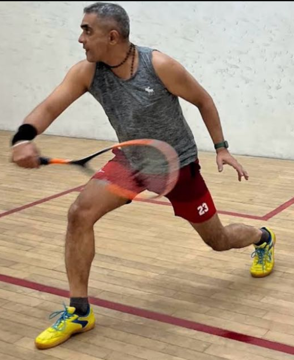 Krishna Joshi on a squash court