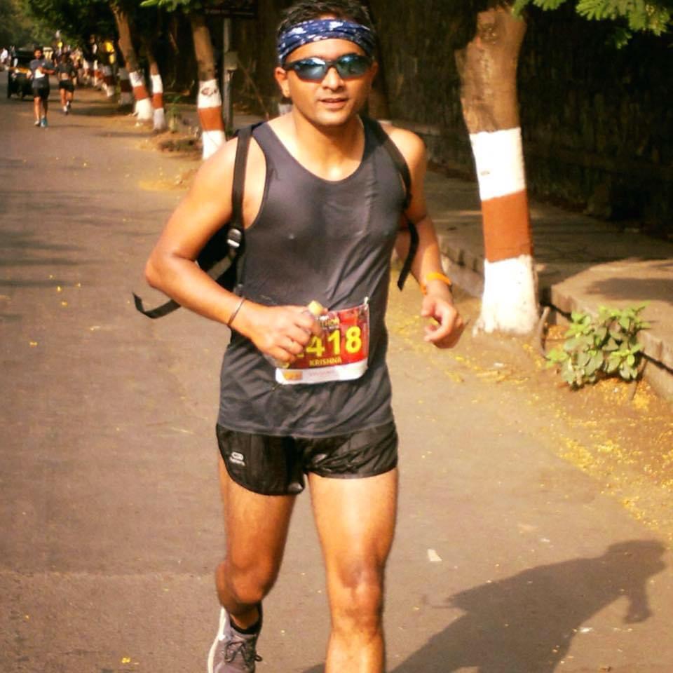 Krishna Joshi running a road race